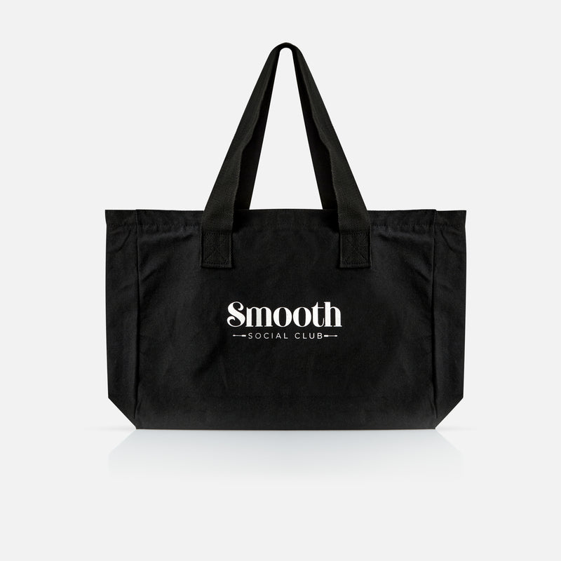 Black tote bag with 'Smooth Social Club' text on a white background