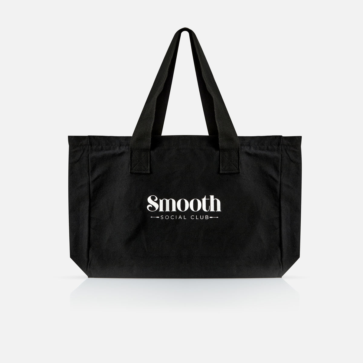 Black tote bag with 'Smooth Social Club' text on a white background